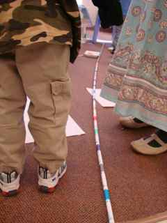 Line of markers on the floor created by some of the head start kids