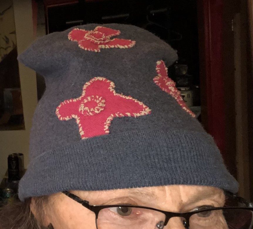 Deirdre's hat on head